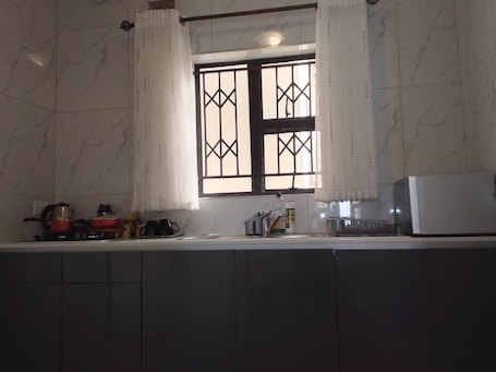 Apartment | Private kitchen | Fridge, microwave, oven, stovetop