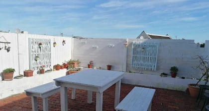 Adorable 2 bedroom apartment with enclosed courtyard and partial sea view