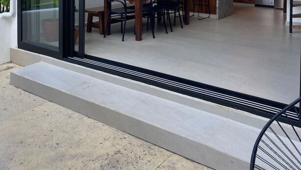 A modern kitchen with a dining area visible through glass doors. - Beautiful Vallarta View Condo*********** (Puerto Vallarta)