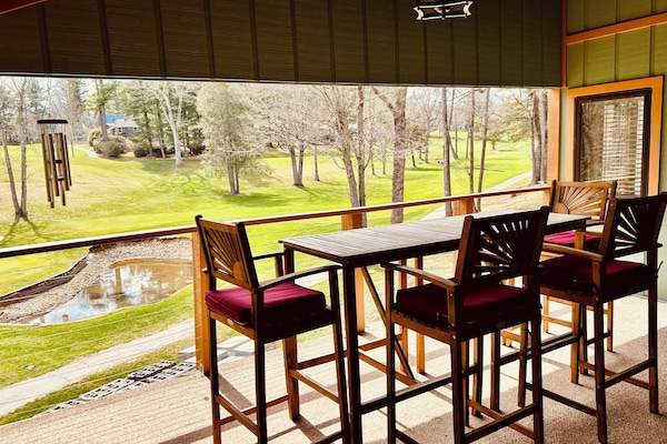 Fabulous view of the golf course from the private covered beckon the main floor