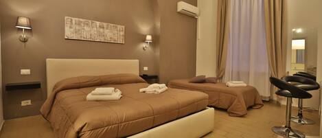 1 slaapkamer, een bureau, een laptopwerkplek, gratis wifi