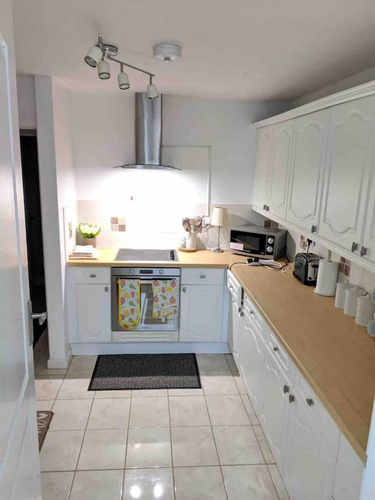 Fridge, microwave, coffee/tea maker, cookware/dishes/utensils