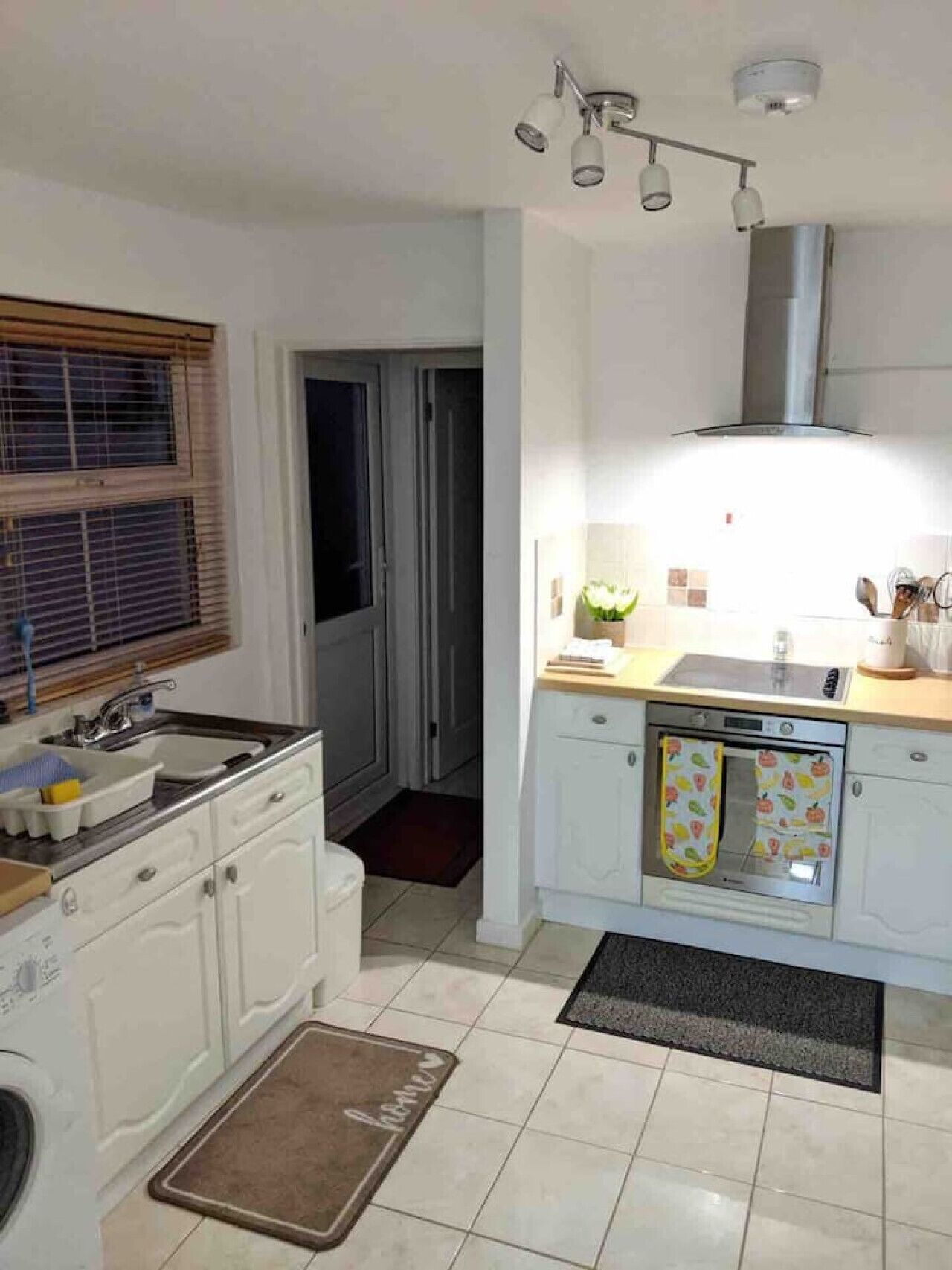 Fridge, microwave, coffee/tea maker, cookware/dishes/utensils