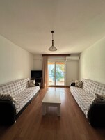 Apartamento básico | 2 quartos, Wi-Fi de cortesia, roupa de cama