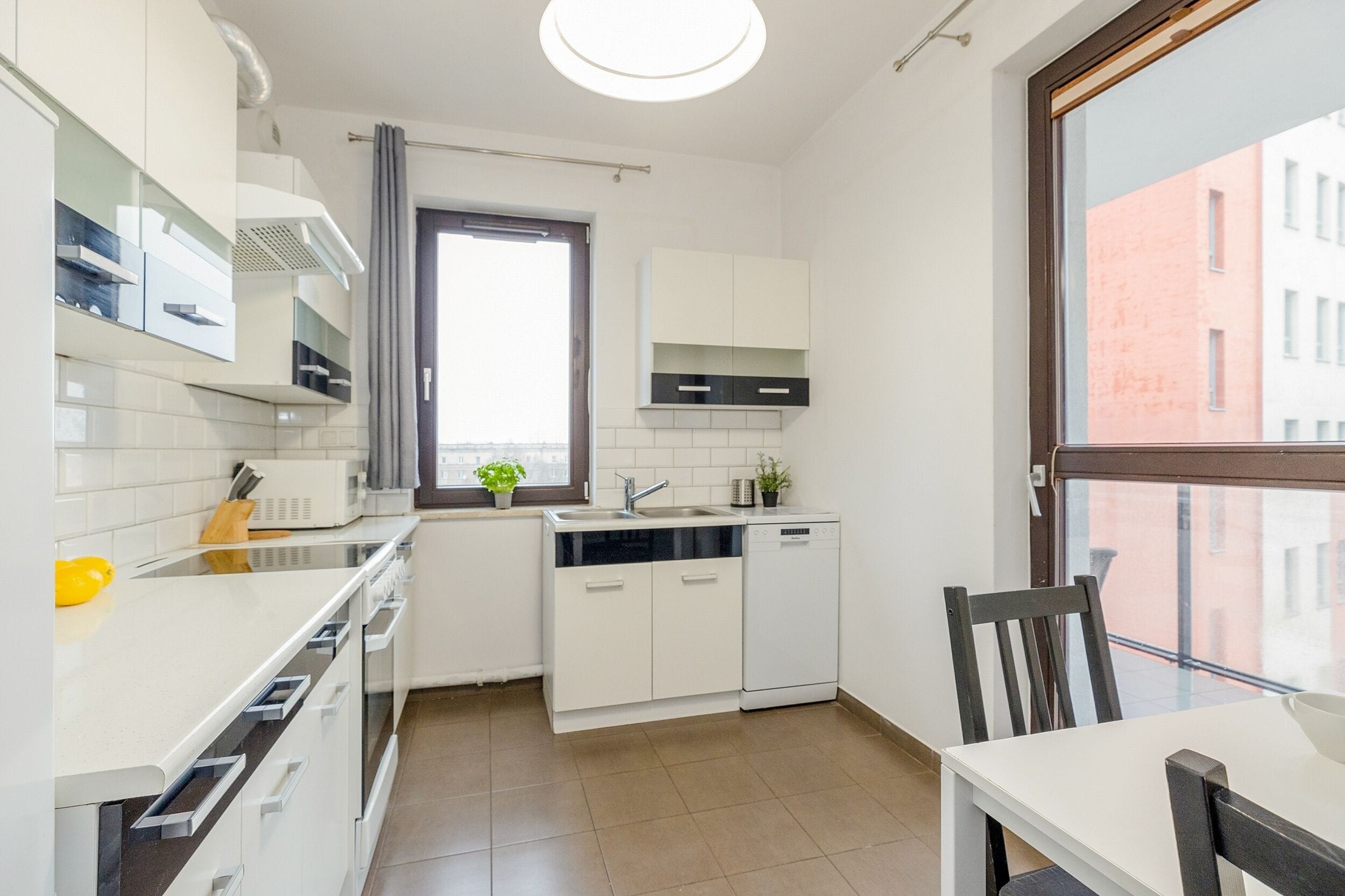 Deluxe appartement | Privékeuken | Een koelkast/vriezer, een magnetron, een oven, een kookplaat