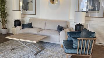 Deluxe Apartment | Living area | Smart TV