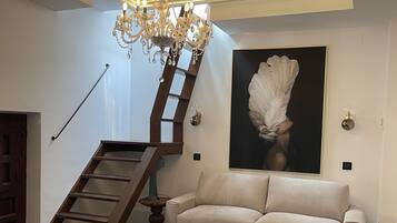 Deluxe Apartment | Living area | Smart TV