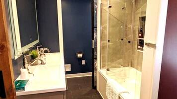 Shower, jetted tub, hair dryer, towels