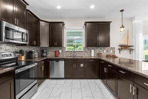 Villa, 6 Bedrooms | Private kitchen | Fridge, oven, coffee/tea maker
