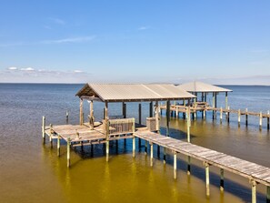 House, 4 Bedrooms | Property grounds - Chele's Bayside Cottage - 2304 Island Shores Dr 4 Bedroom Home by RedAwning (Dauphin Island)