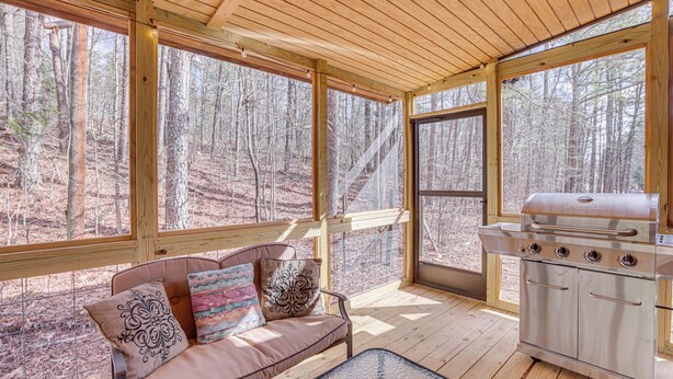 A wooden deck with a grill and a sofa with decorative pillows. - Cropwell Cabin w/ Fire Pit, Near Logan Martin Lake (Cropwell)