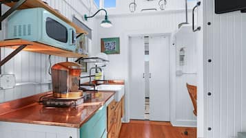 Fridge, microwave, coffee/tea maker, dining tables