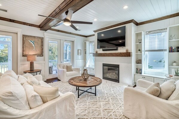 Smart TV, fireplace, books