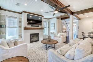 Smart TV, fireplace, books