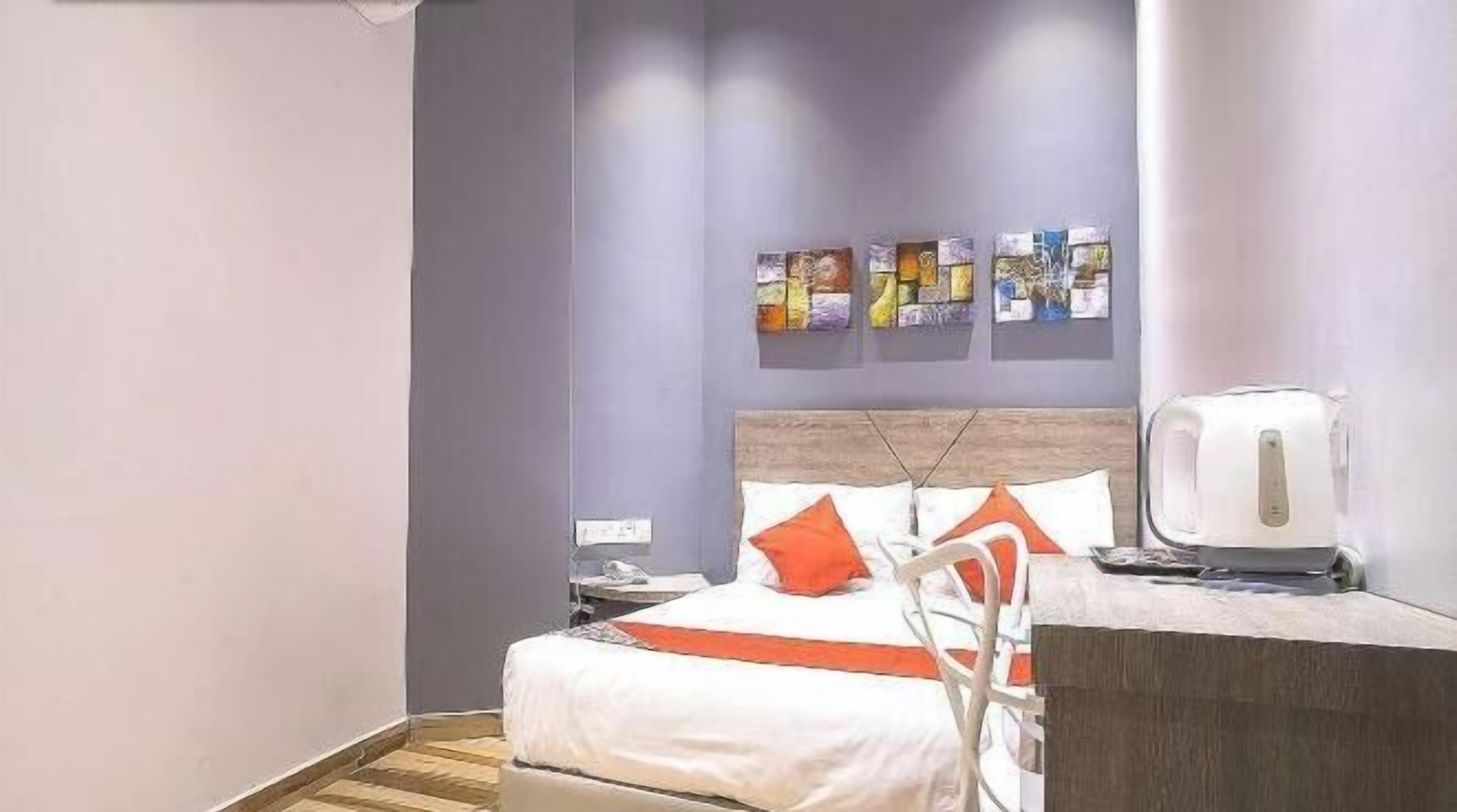Desk, laptop workspace, free WiFi, bed sheets