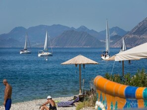Apartment, 2 Bedrooms, Patio, Garden View | Beach | Beach nearby - Mare Mare Thalassa A (Patras)