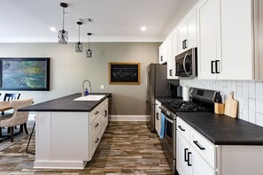 Fridge, microwave, oven, cookware/dishes/utensils