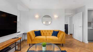 65-inch Smart TV with cable channels, Netflix, streaming services