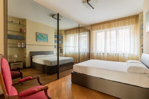 2 quartos, ferros/tábuas de passar roupa, Wi-Fi de cortesia
