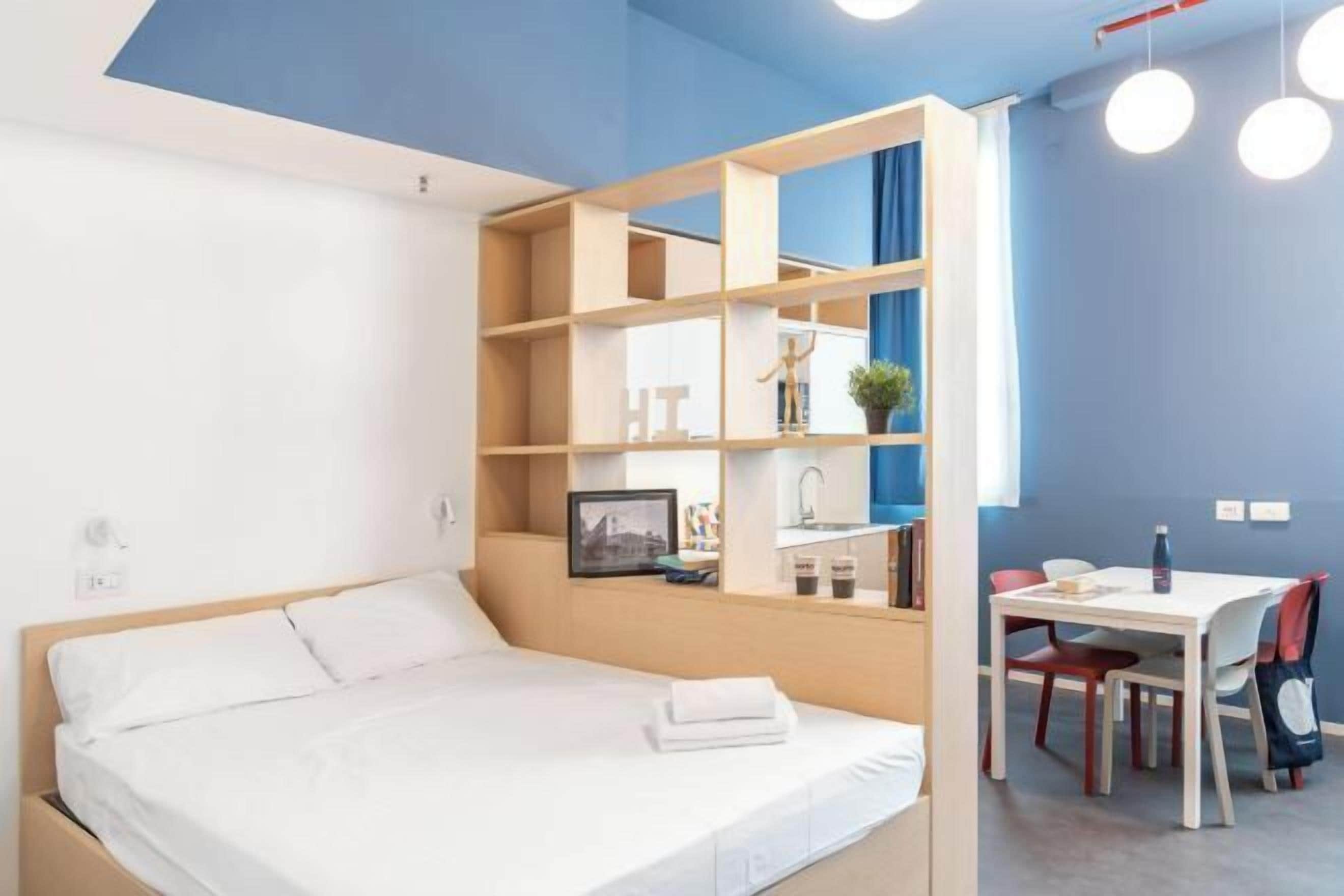 Down comforters, desk, laptop workspace, blackout drapes