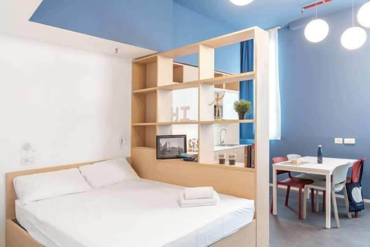 Down comforters, desk, laptop workspace, blackout drapes