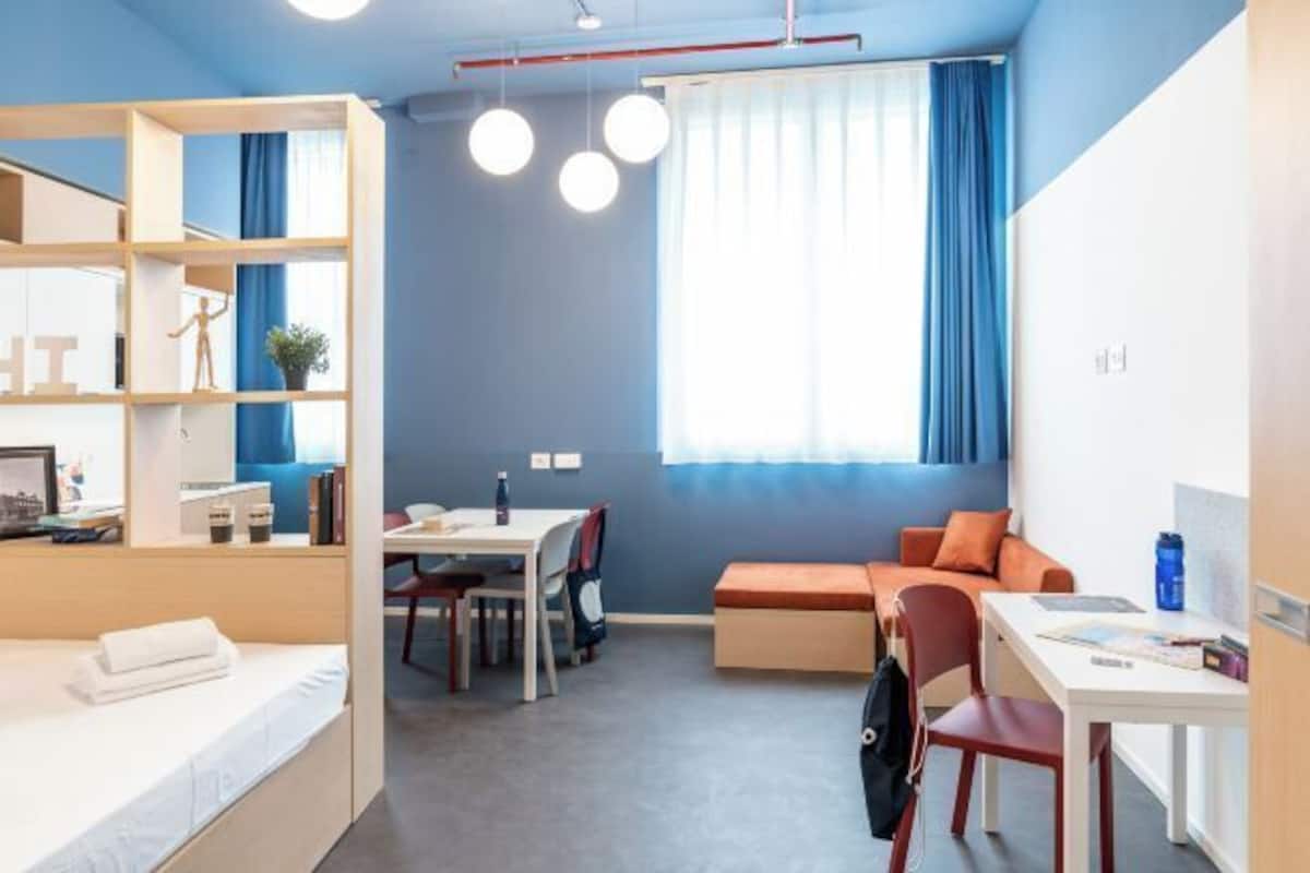 Down comforters, desk, laptop workspace, blackout drapes