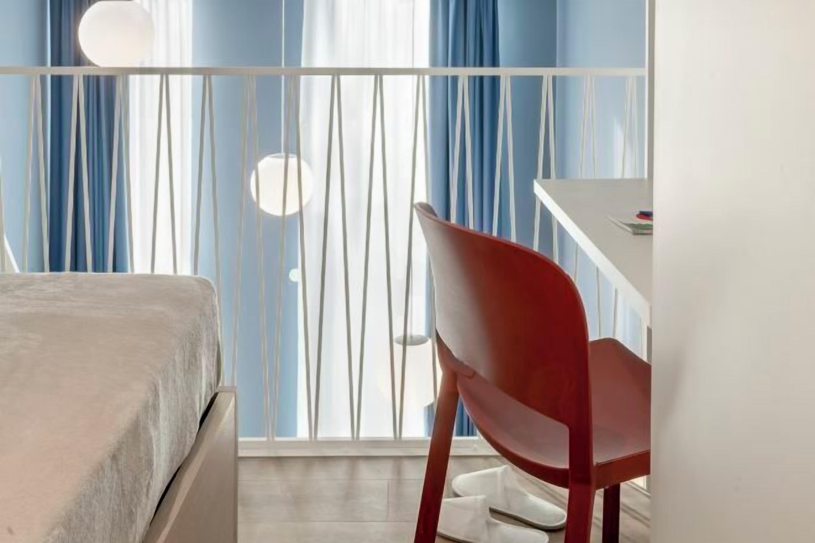 Down comforters, desk, laptop workspace, blackout drapes