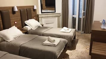 1 quarto, frigobar, roupa de cama
