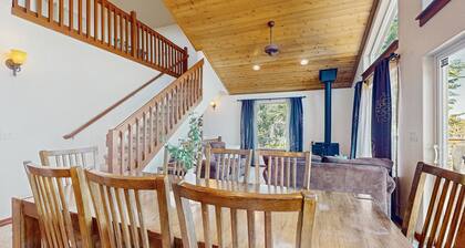 Dog-friendly home with water views, deck, grill, wood stove, & private W/D