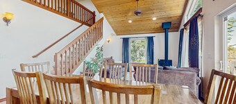 Dog-friendly home with water views, deck, grill, wood stove, & private W/D