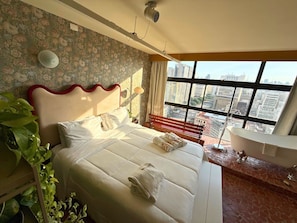 อพาร์ทเมนท์โรแมนติก | 1 ห้องนอน, โต๊ะทำงาน, ผ้าม่านกันแสง, Wi-Fi ฟรี