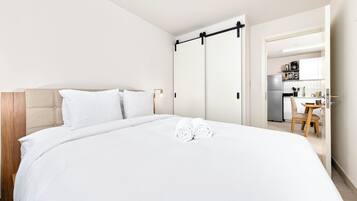 Apartemen Kota | Seprai premium, meja kerja, setrika/meja setrika, dan Wi-Fi gratis