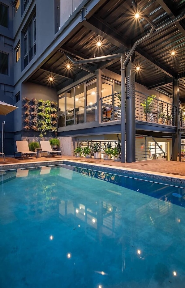 Outdoor pool, open 8:00 AM to 10:00 PM, pool umbrellas, pool loungers