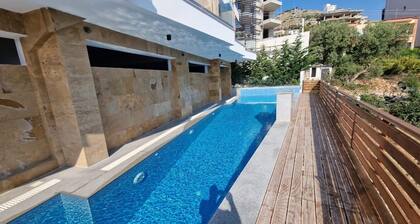 Green Luxe Apartment 2-bedroom apartment with WiFi, AC in peaceful Saranda