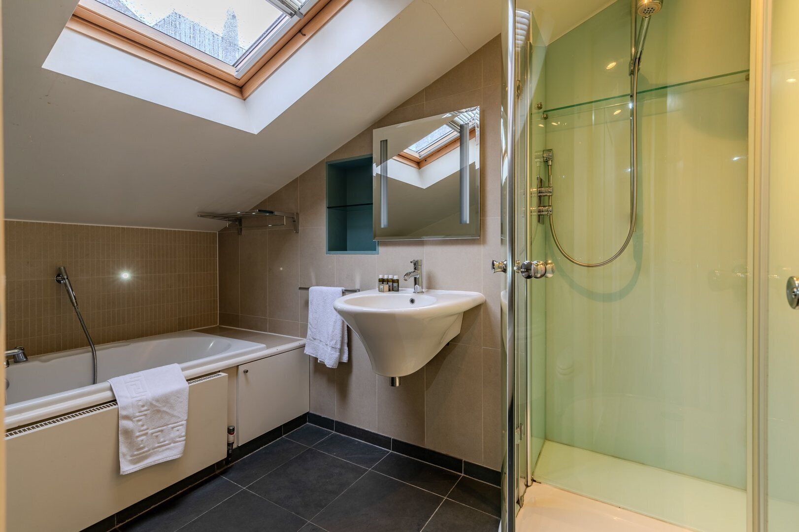Shower, eco-friendly toiletries, towels, soap