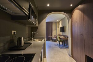 Mini-fridge, espresso maker, electric kettle, highchair