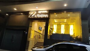 A hotel entrance with a sign reading "Z Suites". - Hotel Bonito- Delhi IGI Airport (New Delhi)