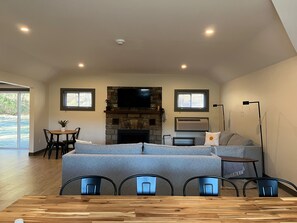 Premium Apartment, 2 Bedrooms, Fireplace, Mountain View | Living area | 55-inch Smart TV with digital channels, Netflix, Hulu - East Rock Inn (Great Barrington)