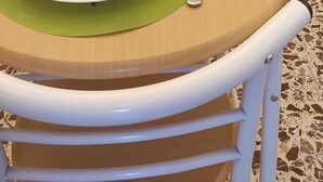 A dining table with two plates, cutlery, and wine glasses set for two. - Studio apartment on Plebiscito Street with kitchenette and balcony on the courtyard (Catania)