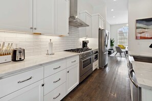 Fridge, microwave, oven, stovetop - West End Oasis • Modern Rooftop Views (Nashville)