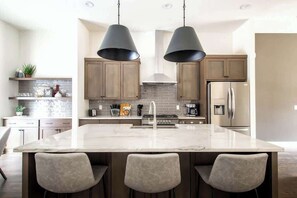 Fridge, microwave, oven, stovetop - Stylish West End Stay • Rooftop & Patio (Nashville)