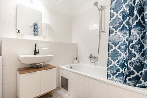 Hair dryer, towels, soap, shampoo