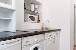 Microwave, stovetop, coffee/tea maker, toaster