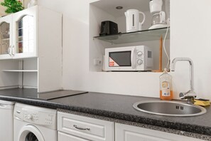 Microwave, stovetop, coffee/tea maker, toaster