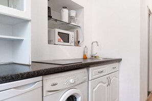 Microwave, stovetop, coffee/tea maker, toaster