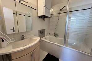 Hair dryer, towels, soap, shampoo