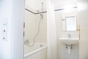 Hair dryer, towels, soap, shampoo