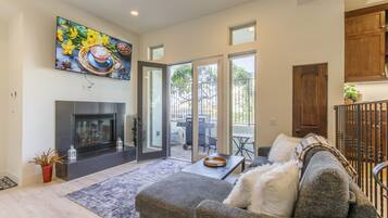 Smart TV, fireplace, foosball, books