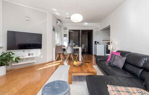 TV, fireplace - Holiday home with terrace and pool (Poljane)