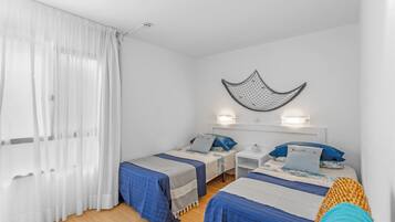 1 dormitorio, tabla de planchar con plancha, wifi gratis y ropa de cama